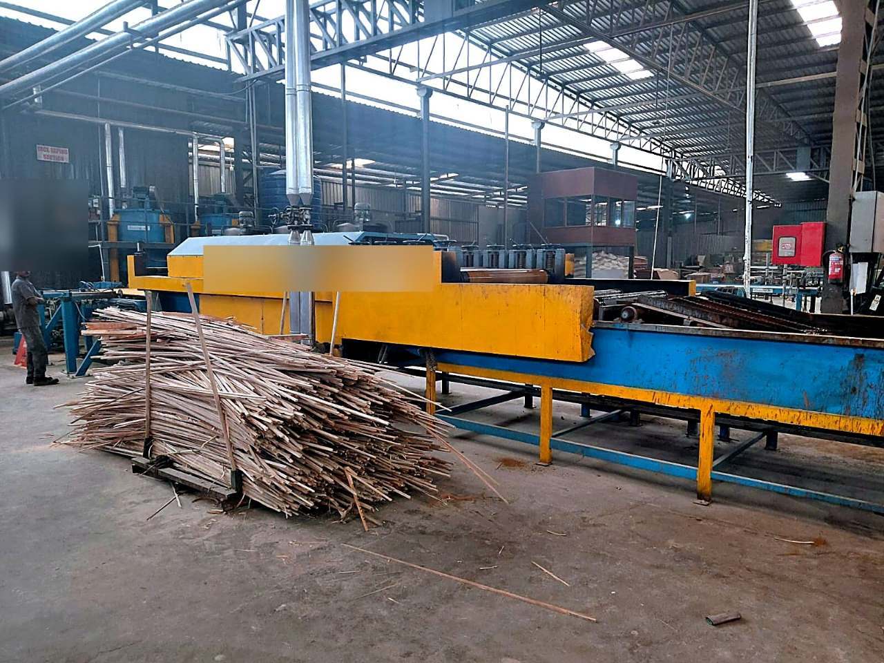 Rough-sawn Kerala hardwood stacked on the processing line at our group’s Perumbavoor operations