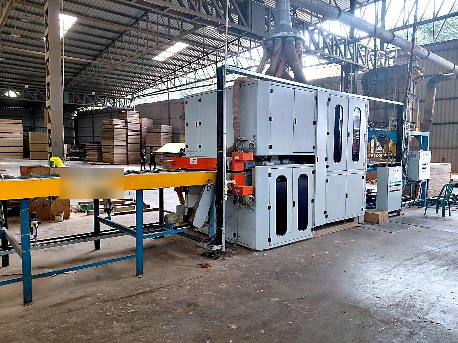 Stacked plywood and panels at Cochin Wood Industries